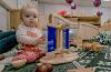 Baby playing with instruments