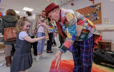 Magician with little girl