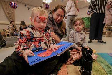 Family reading together 
