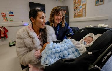 Health visitor and baby