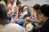 Baby class at Sunderland Family Hubs - group of babies playing on a mat at a club
